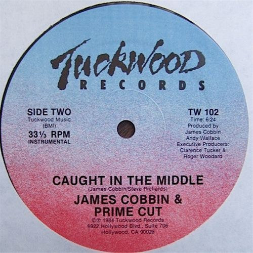James Cobbin & Prime Cut: Caught up in the midle